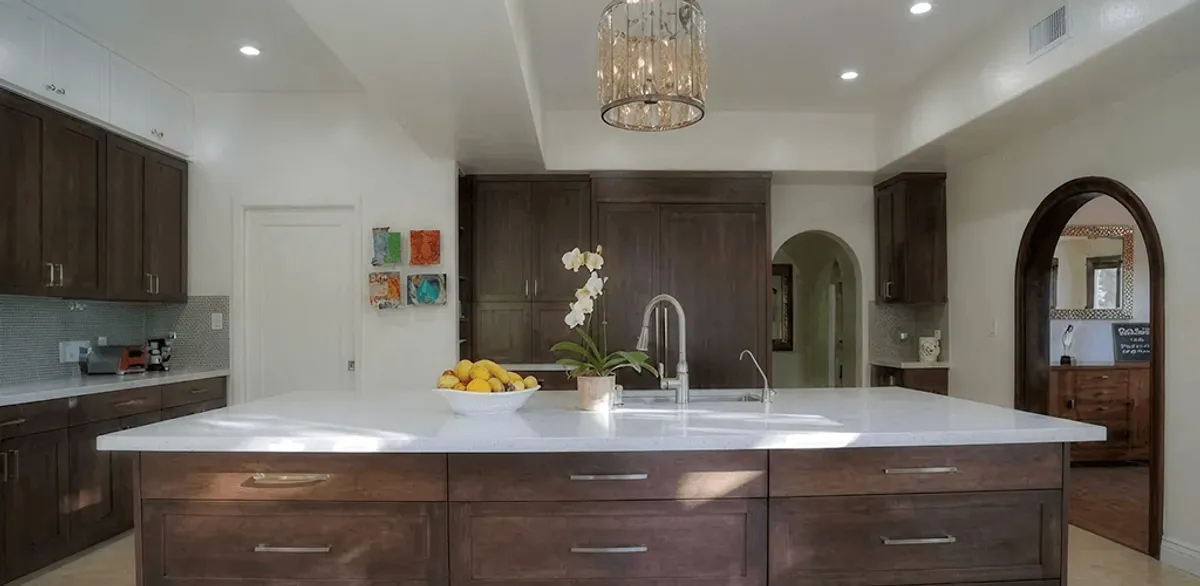 Cabinet refacing project with updated kitchen cabinets and island in Orange, CA